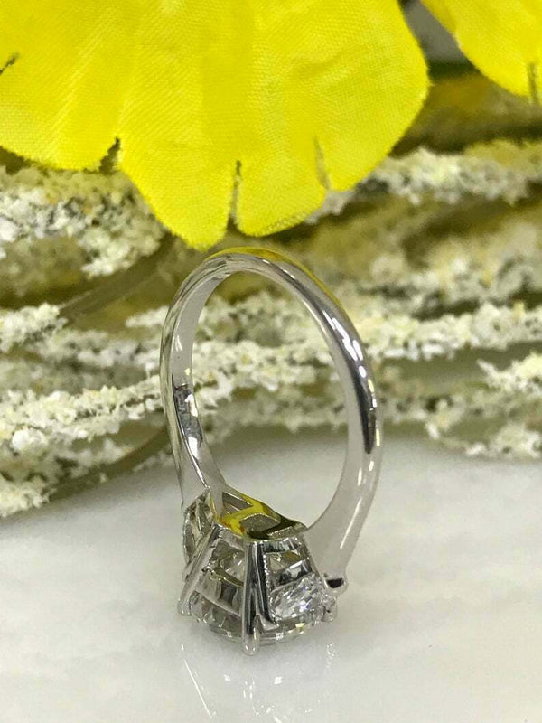 3.00 Ct. Round cut Moissanite Three Stone Engagement Ring by Black Jack