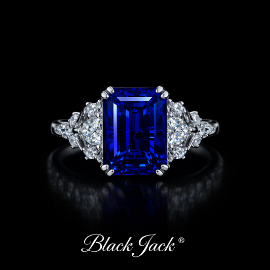 3.85 Ct Emerald Cut Blue Sapphire Ring with Moissanite Side Stones – 14K Gold Plated Sterling Silver Black Jack®