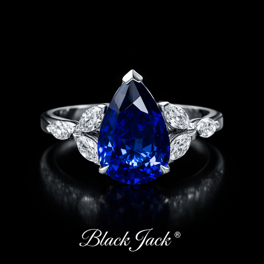 2.45 Ct Pear Cut Blue Sapphire Ring with Marquise & Round Moissanite in 14K Gold Plated Sterling Silver Black Jack®